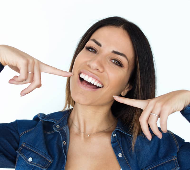 girl showing whitened teeth