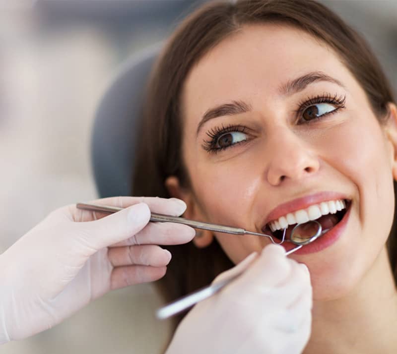 girl smiling during dental fillings
