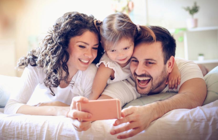 parents with child smiling